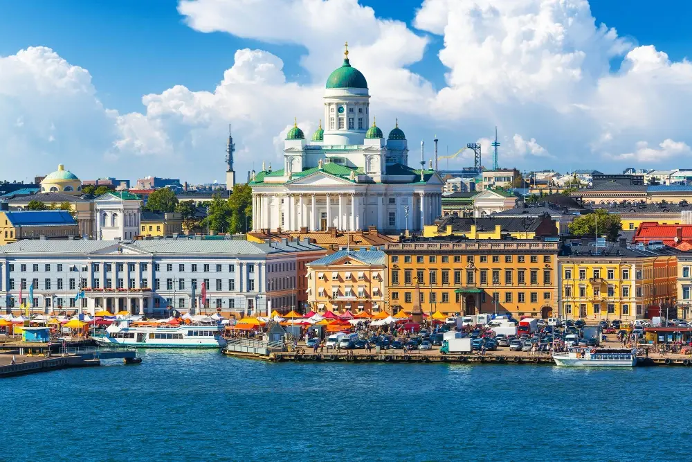  Helsinki, Finland, with a view of the harbor and the iconic Helsinki Cathedral. 