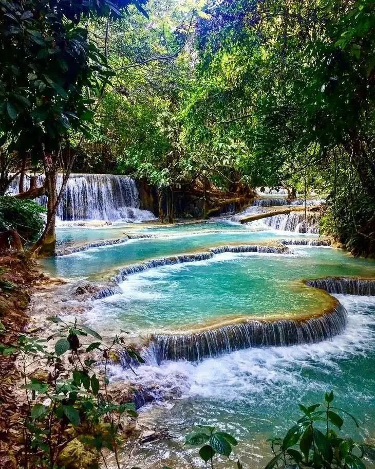  Kuang Si Falls (also spelled Kuang Xi), a prominent natural attraction located near Luang Prabang, Laos. 